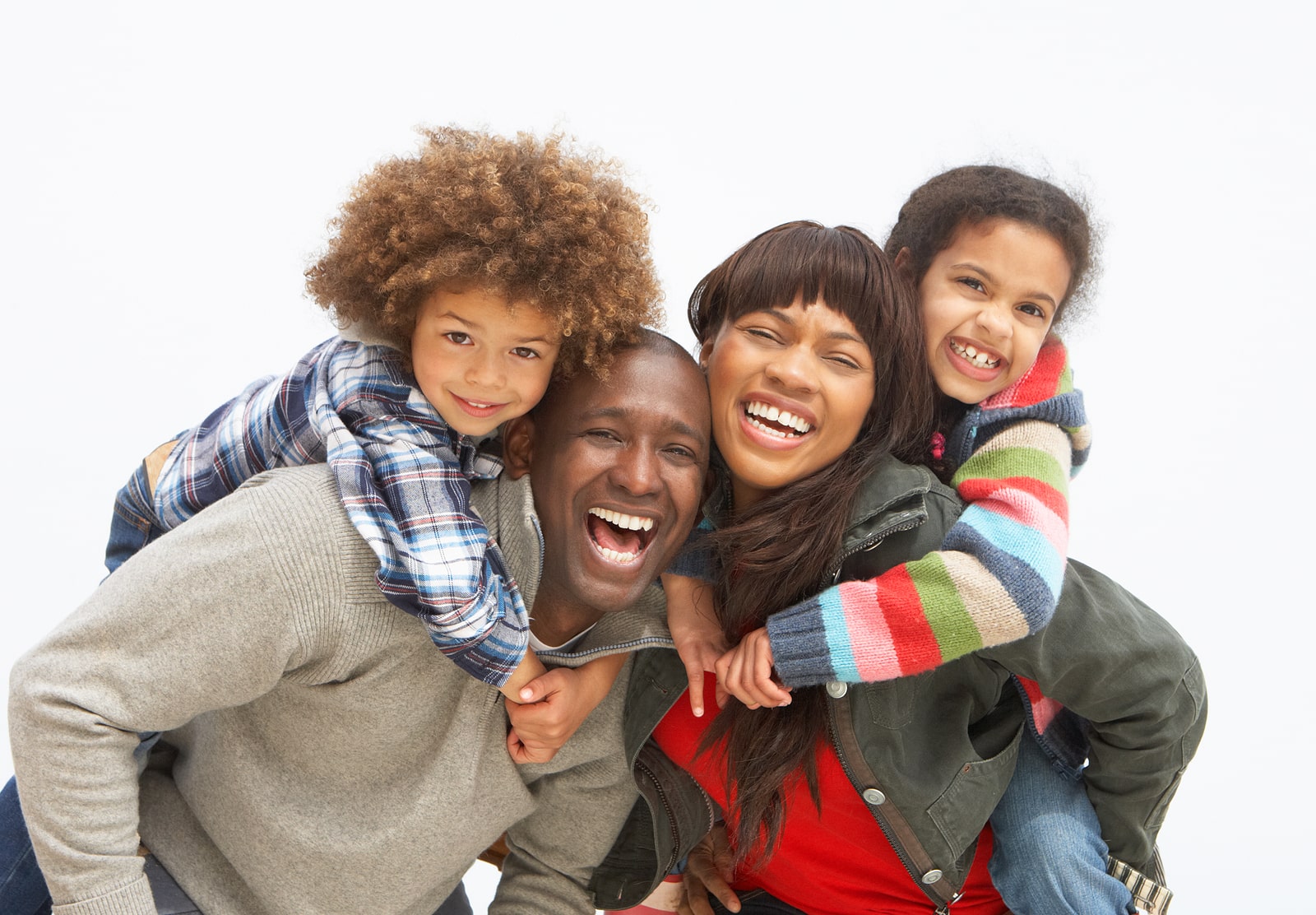 Young-Family-Relaxing-On-Beach